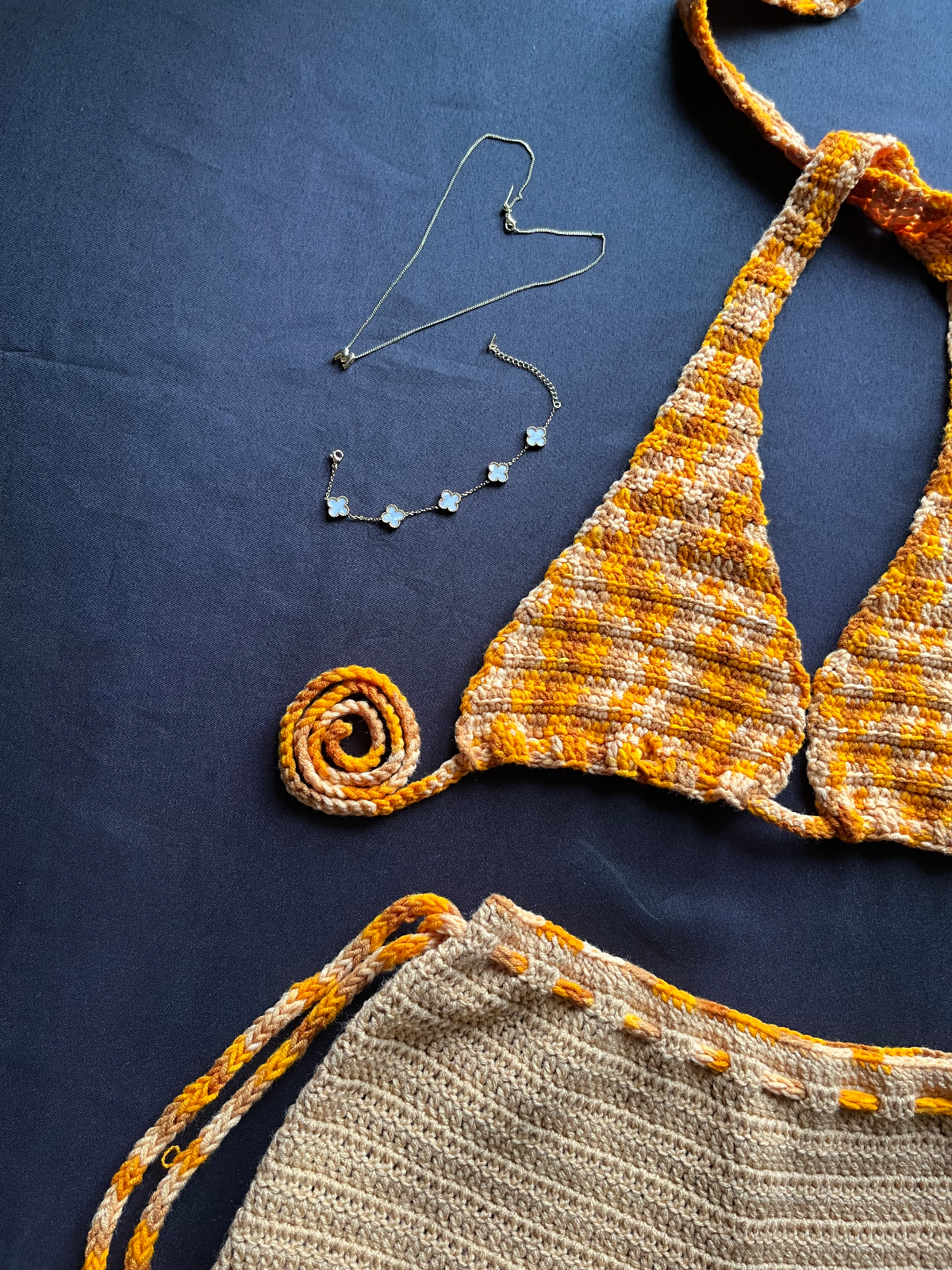 Crochet dresses, beach wear and bikini sets
